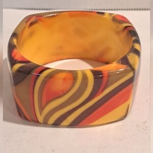 Chunky Lucite Bangle with Orange, Brown, Green and Yellow Stripes, ca. 1960s